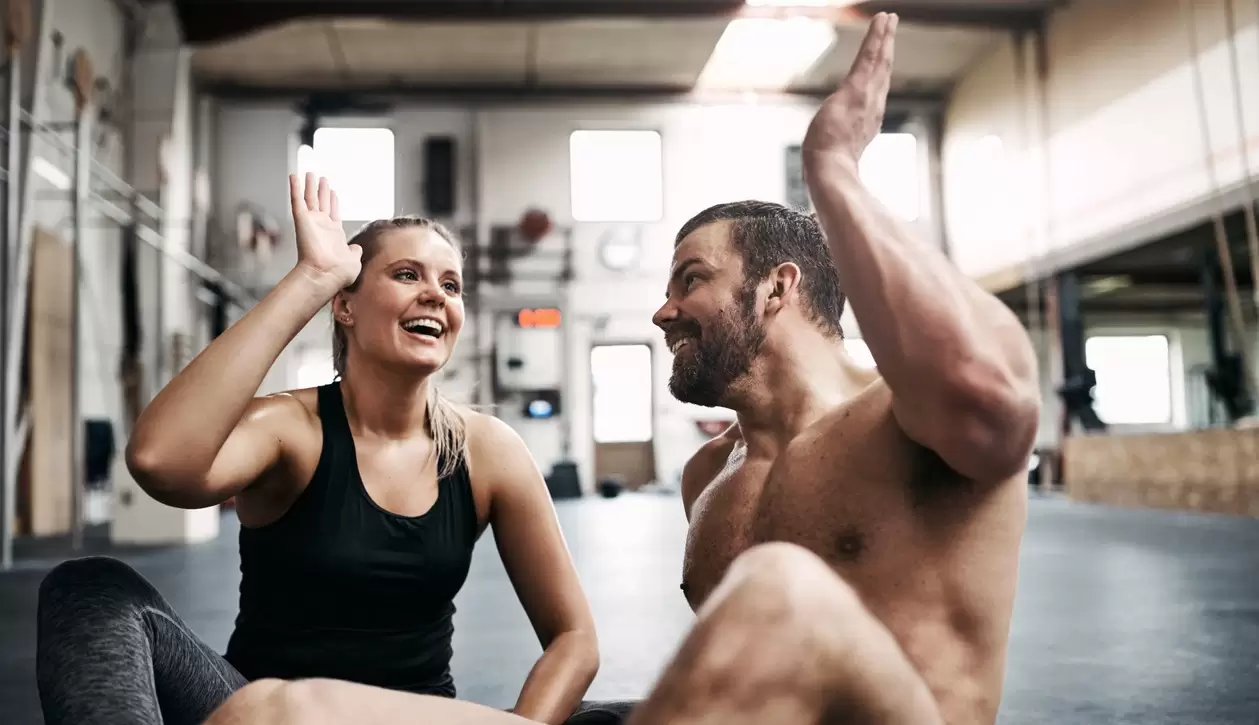 fit young couple high fiving together after a work 2024 09 15 05 27 04 utc 1 1